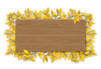 Осення картинка для оформления с деревянным фоном и желтыми листьями